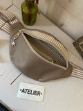 BANANE simili beige , doublée coton , avec poche