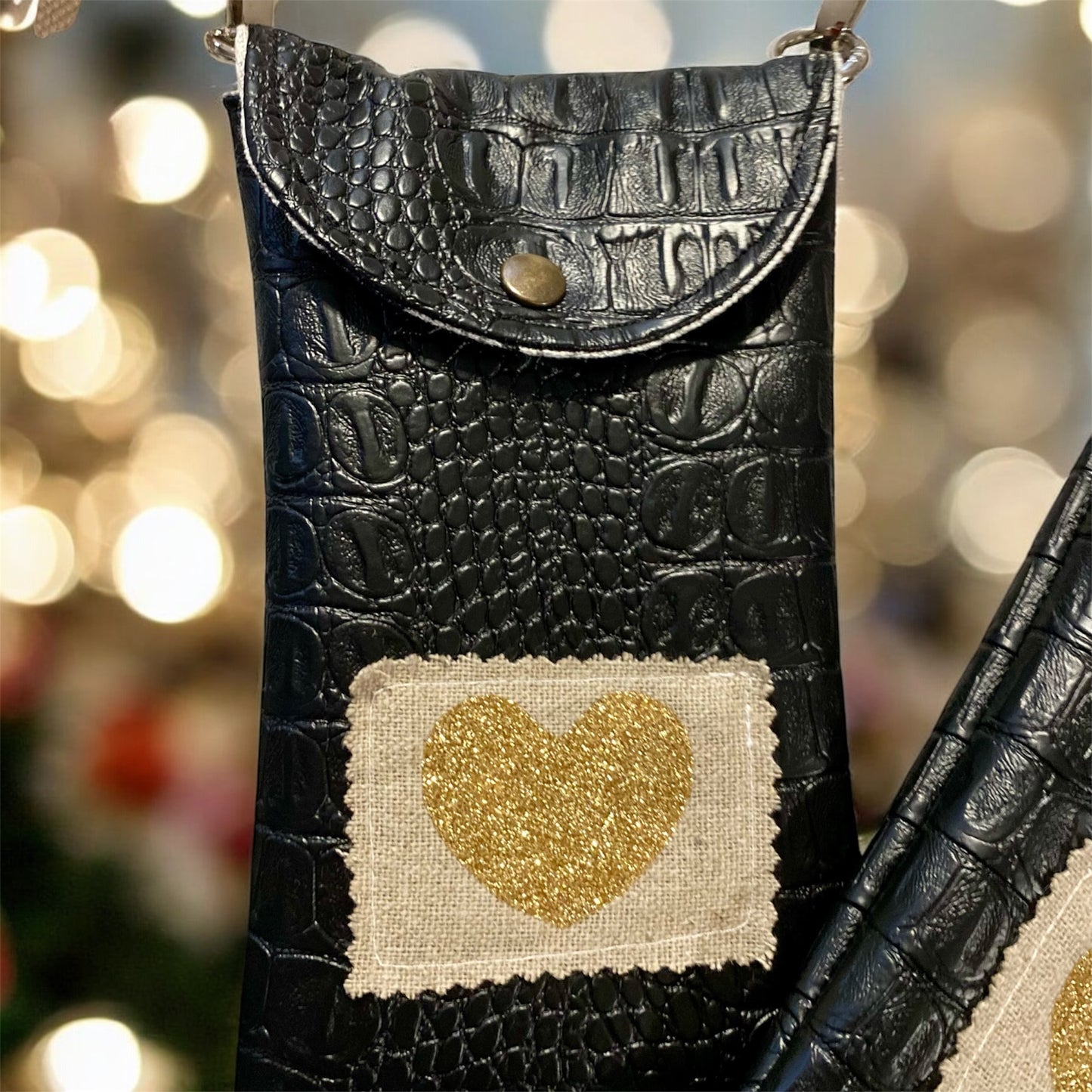 POCHETTES SMARTPHONE , simili croco noir , sangle coton réglable et amovible .